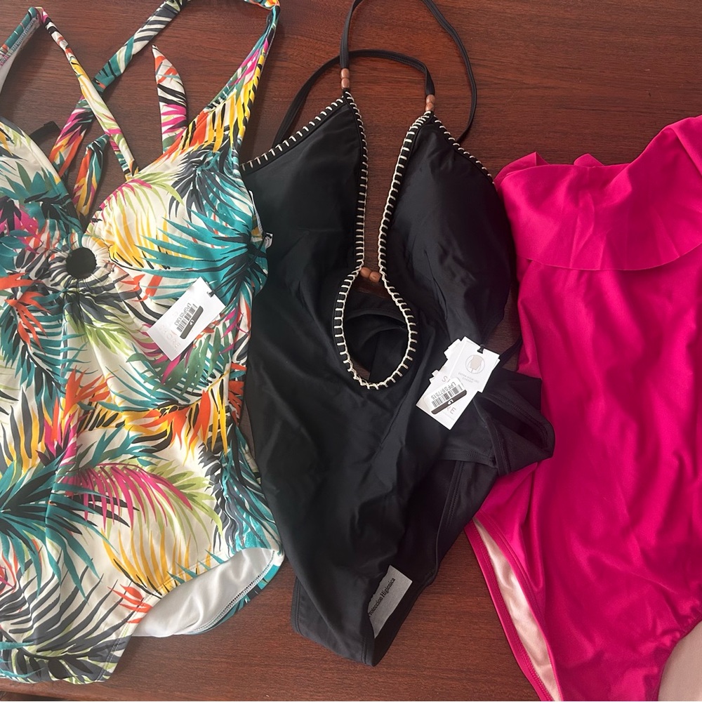 Three NEW WITH TAGS with women’s one piece bathing suits size large (12-14)!